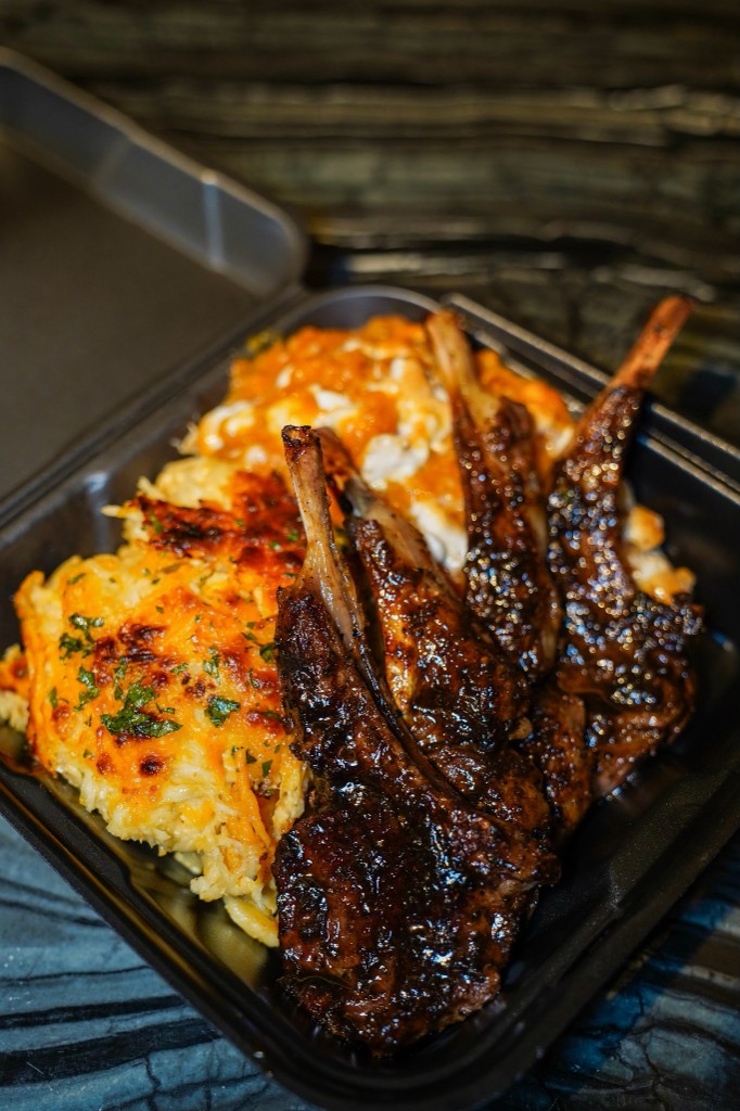 Glazed lamb chops served with cajun mac and cheese